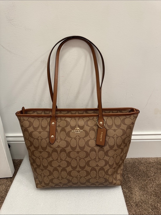 Coach Handbags - Coach Brown Signature Canvas city tote bag with hangtag